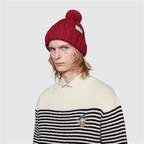 Knit wool hat with Gucci label 